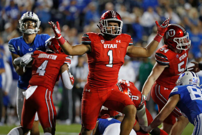 Utah Utes linebacker Nephi Sewell (1) reacts after a stop against the Brigham Young Cougars.